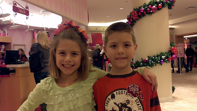 Grinning and bearing it at American Girl Place salon
